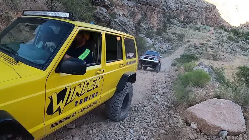 Jeep pulls broken Toyota 4 Runner out of